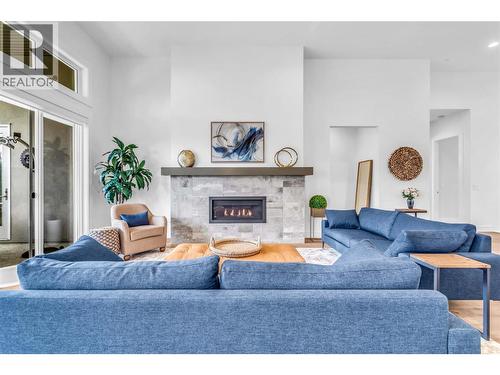 3452 Blue Grass Lane, Kelowna, BC - Indoor Photo Showing Living Room With Fireplace