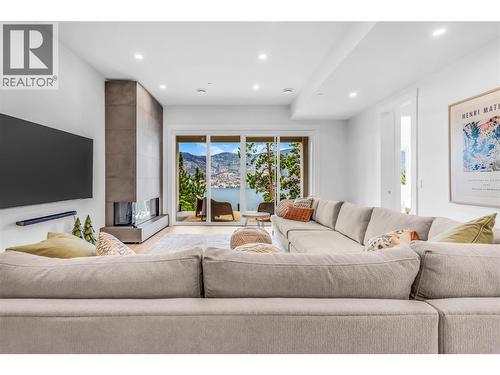 Family Room on lower level - 3452 Blue Grass Lane, Kelowna, BC - Indoor Photo Showing Living Room