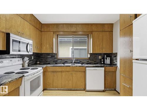 8911 83 Av Nw, Edmonton, AB - Indoor Photo Showing Kitchen With Double Sink
