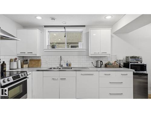 8911 83 Av Nw, Edmonton, AB - Indoor Photo Showing Kitchen With Double Sink