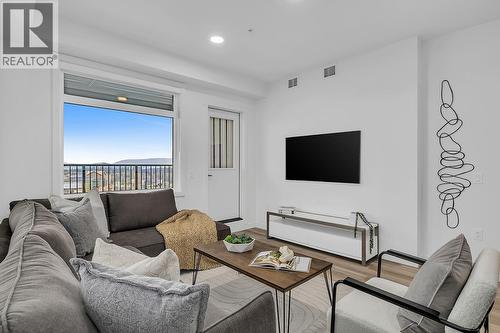 photos are of our showhome - 1057 Frost Road Unit# 317, Kelowna, BC - Indoor Photo Showing Living Room