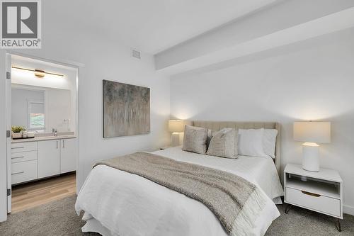 photos are of our showhome - 1057 Frost Road Unit# 317, Kelowna, BC - Indoor Photo Showing Bedroom