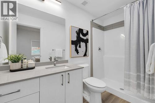 Primary ensuite - photos are of our showhome - 1057 Frost Road Unit# 317, Kelowna, BC - Indoor Photo Showing Bathroom