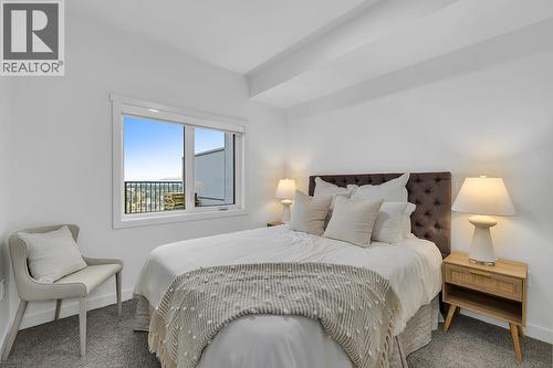 photos are of our showhome - 1057 Frost Road Unit# 317, Kelowna, BC - Indoor Photo Showing Bedroom