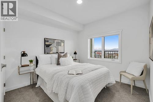 photos are of our showhome - 1057 Frost Road Unit# 317, Kelowna, BC - Indoor Photo Showing Bedroom