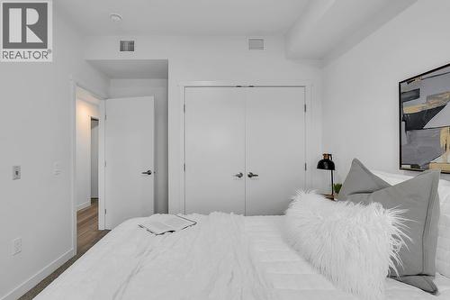 photos are of our showhome - 1057 Frost Road Unit# 317, Kelowna, BC - Indoor Photo Showing Bedroom