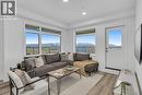 A 3-bed, 2-bath condo - photos are of our showhome - 1057 Frost Road Unit# 317, Kelowna, BC  - Indoor Photo Showing Living Room 