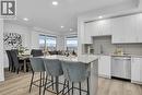 Kitchen with large island & seating - photos are of our showhome - 1057 Frost Road Unit# 317, Kelowna, BC  - Indoor 