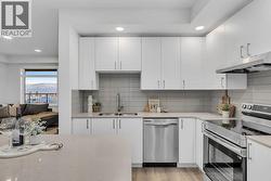 Stainless steel range with ceramic stovetop - photos are of our showhome - 