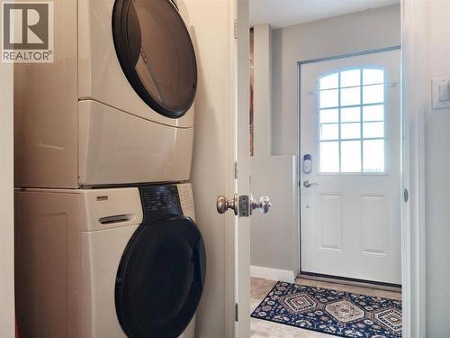 310 54 Avenue E, Claresholm, AB - Indoor Photo Showing Laundry Room