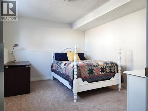 310 54 Avenue E, Claresholm, AB - Indoor Photo Showing Bedroom
