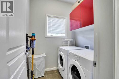 1511 Wentworth Villas Sw, Calgary, AB - Indoor Photo Showing Laundry Room