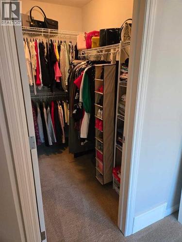 1511 Wentworth Villas Sw, Calgary, AB - Indoor With Storage