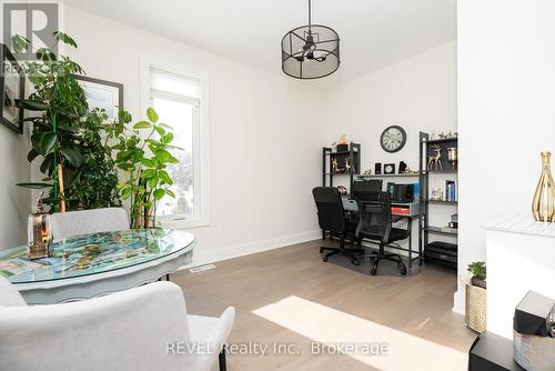 The main floor den currently used as an office. - 1 Princeton Common Street, St. Catharines (Lakeport), ON 