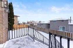 View of wooden balcony featuring a residential view and a wooden deck - 