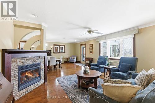 405 Echo Dr - 407 Echo Drive, Ottawa, ON - Indoor Photo Showing Living Room With Fireplace