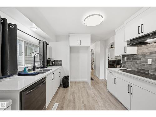 10656 93 St Nw, Edmonton, AB - Indoor Photo Showing Kitchen With Double Sink