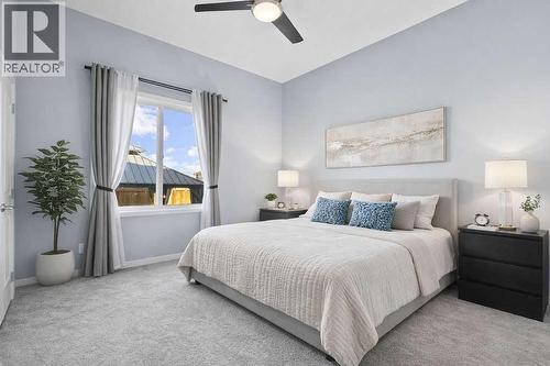 Primary bedroom - 103 Masters Heights Se, Calgary, AB - Indoor Photo Showing Bedroom