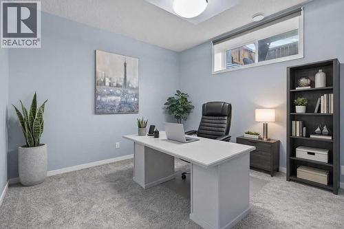 Basement bedroom with walk-in closet - 103 Masters Heights Se, Calgary, AB - Indoor Photo Showing Office
