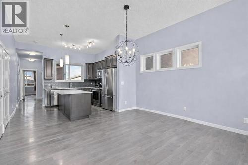 103 Masters Heights Se, Calgary, AB - Indoor Photo Showing Kitchen With Upgraded Kitchen