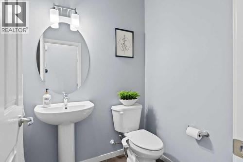 Main floor powder room - 103 Masters Heights Se, Calgary, AB - Indoor Photo Showing Bathroom