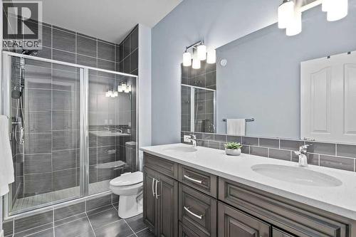 4 Piece ensuite with step-in shower - 103 Masters Heights Se, Calgary, AB - Indoor Photo Showing Bathroom