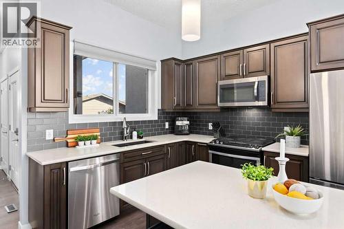 103 Masters Heights Se, Calgary, AB - Indoor Photo Showing Kitchen With Upgraded Kitchen