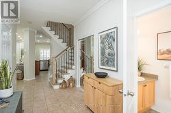 Inviting foyer w interior access from 2 car garage - 