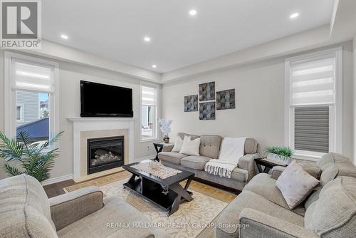 229 Meadowbreeze Drive, Ottawa, ON - Indoor Photo Showing Living Room With Fireplace