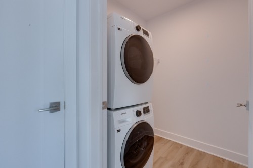 Salle de lavage - 303-8945 Boul. Viau, Montréal (Saint-Léonard), QC - Indoor Photo Showing Laundry Room