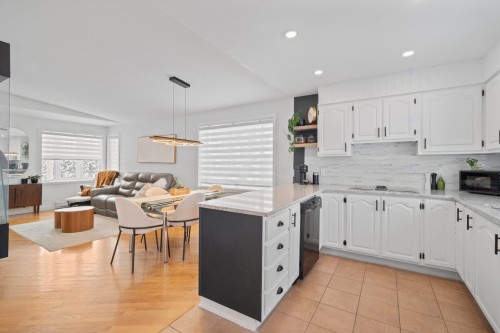 Salle à manger - 5 Rue Île-Mathieu, Laval (Saint-François), QC - Indoor Photo Showing Kitchen With Upgraded Kitchen