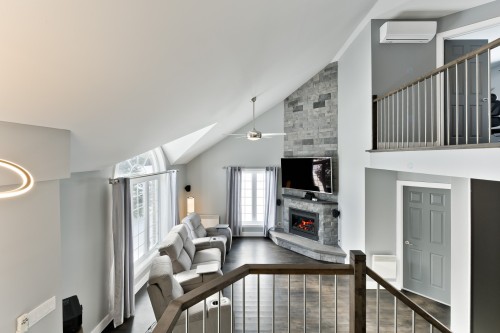 Living Room - 170 Rue Jean, Saint-Jean-Sur-Richelieu, QC - Indoor With Fireplace