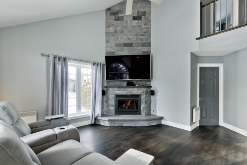 Living Room - 170 Rue Jean, Saint-Jean-Sur-Richelieu, QC - Indoor Photo Showing Living Room With Fireplace
