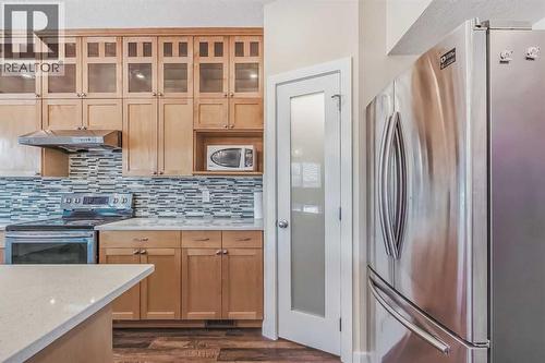 23 Cheltenham Road Nw, Calgary, AB - Indoor Photo Showing Kitchen With Stainless Steel Kitchen