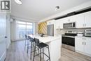3409, 200 Seton Circle Se, Calgary, AB  - Indoor Photo Showing Kitchen With Stainless Steel Kitchen 