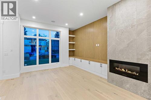 520 34A Street Nw, Calgary, AB - Indoor With Fireplace