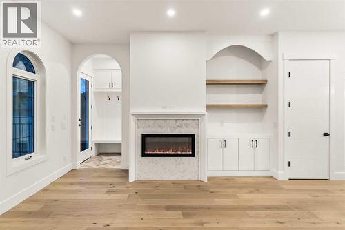 520 34A Street Nw, Calgary, AB - Indoor Photo Showing Other Room With Fireplace