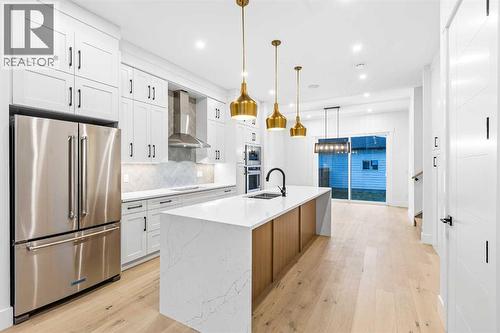 520 34A Street Nw, Calgary, AB - Indoor Photo Showing Kitchen With Stainless Steel Kitchen With Upgraded Kitchen