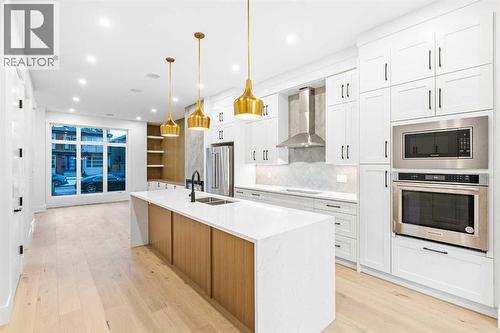 520 34A Street Nw, Calgary, AB - Indoor Photo Showing Kitchen With Double Sink With Upgraded Kitchen