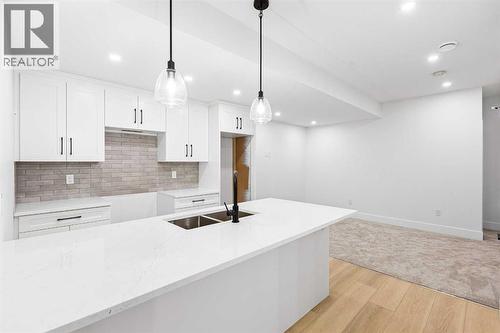 520 34A Street Nw, Calgary, AB - Indoor Photo Showing Kitchen With Double Sink With Upgraded Kitchen