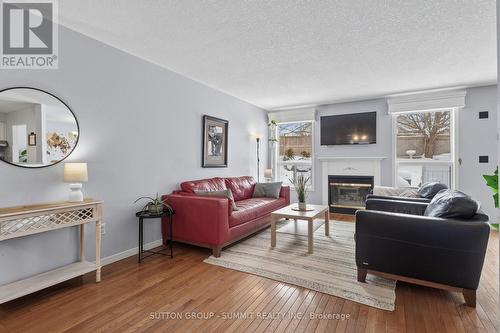 20 Endeavour Drive, Cambridge, ON - Indoor Photo Showing Living Room With Fireplace