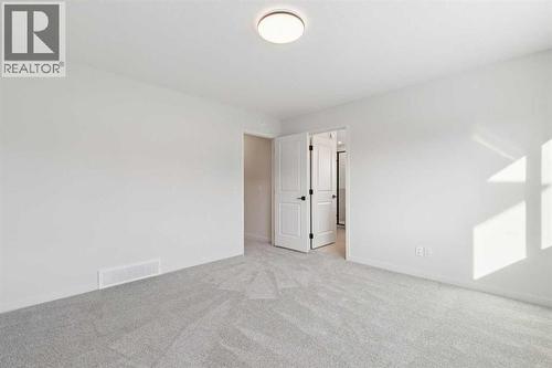 16 Calhoun Rise Ne, Calgary, AB - Indoor Photo Showing Other Room