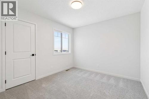 16 Calhoun Rise Ne, Calgary, AB - Indoor Photo Showing Other Room