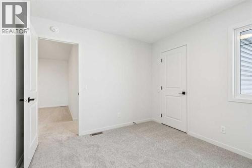 16 Calhoun Rise Ne, Calgary, AB - Indoor Photo Showing Other Room