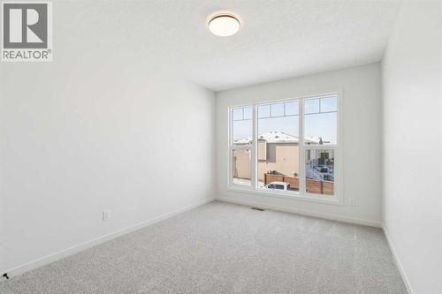 16 Calhoun Rise Ne, Calgary, AB - Indoor Photo Showing Other Room
