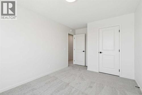 16 Calhoun Rise Ne, Calgary, AB - Indoor Photo Showing Other Room