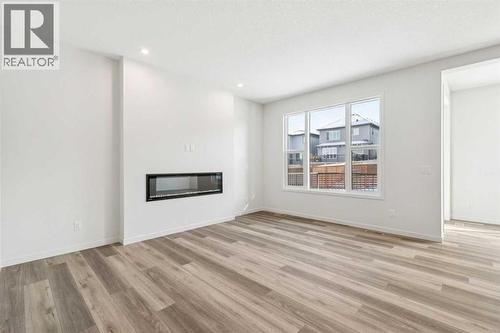 16 Calhoun Rise Ne, Calgary, AB - Indoor With Fireplace