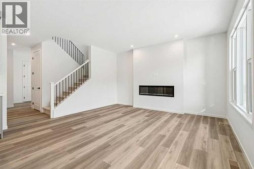 16 Calhoun Rise Ne, Calgary, AB - Indoor With Fireplace