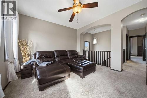 65 Elgin Meadows Circle Se, Calgary, AB - Indoor Photo Showing Living Room