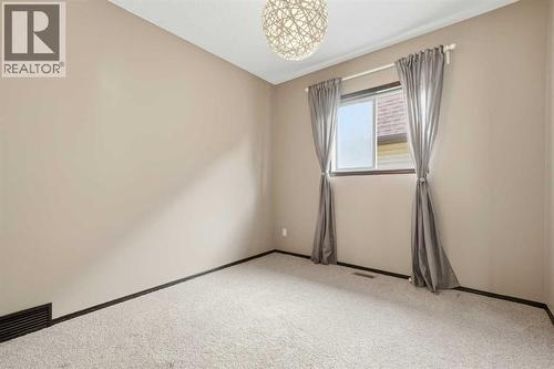 2nd Bedroom - 65 Elgin Meadows Circle Se, Calgary, AB - Indoor Photo Showing Other Room